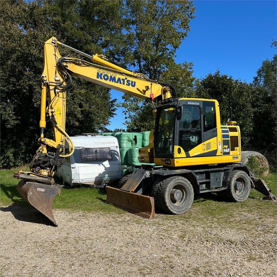 Komatsu PW148-11 - Pyöräalustainen kaivinkone: kuva Komatsu PW148-11 - Pyöräalustainen kaivinkone Komatsu PW148-11 - Pyöräalustainen kaivinkone: kuva Komatsu PW148-11 - Pyöräalustainen kaivinkone