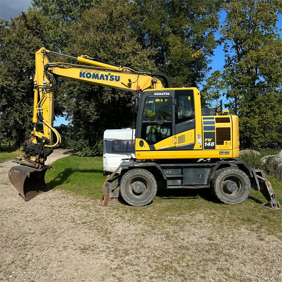 Komatsu PW148-11 - Pyöräalustainen kaivinkone: kuva Komatsu PW148-11 - Pyöräalustainen kaivinkone Komatsu PW148-11 - Pyöräalustainen kaivinkone: kuva Komatsu PW148-11 - Pyöräalustainen kaivinkone