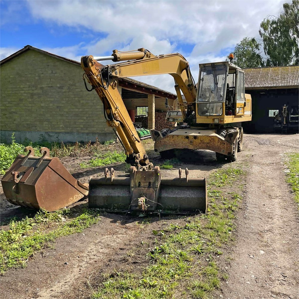 Liebherr A 902 - Pyöräalustainen kaivinkone: kuva Liebherr A 902 - Pyöräalustainen kaivinkone Liebherr A 902 - Pyöräalustainen kaivinkone: kuva Liebherr A 902 - Pyöräalustainen kaivinkone