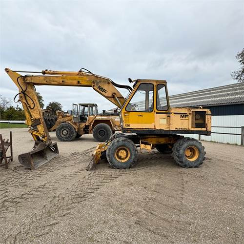 Massey Ferguson W350 C - Pyöräalustainen kaivinkone: kuva Massey Ferguson W350 C - Pyöräalustainen kaivinkone Massey Ferguson W350 C - Pyöräalustainen kaivinkone: kuva Massey Ferguson W350 C - Pyöräalustainen kaivinkone