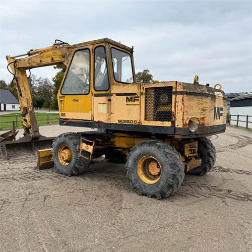 Massey Ferguson W350 C - Pyöräalustainen kaivinkone: kuva Massey Ferguson W350 C - Pyöräalustainen kaivinkone Massey Ferguson W350 C - Pyöräalustainen kaivinkone: kuva Massey Ferguson W350 C - Pyöräalustainen kaivinkone