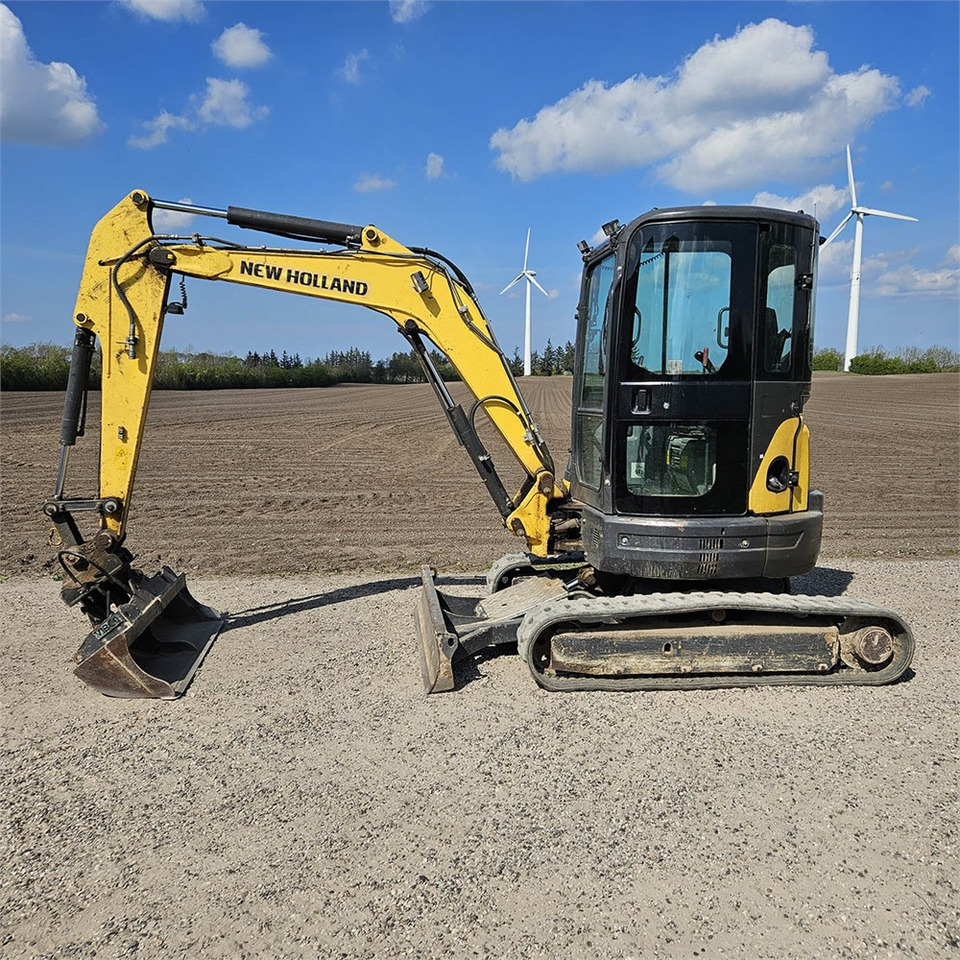 New Holland E39 B - Minikuormaaja: kuva New Holland E39 B - Minikuormaaja New Holland E39 B - Minikuormaaja: kuva New Holland E39 B - Minikuormaaja