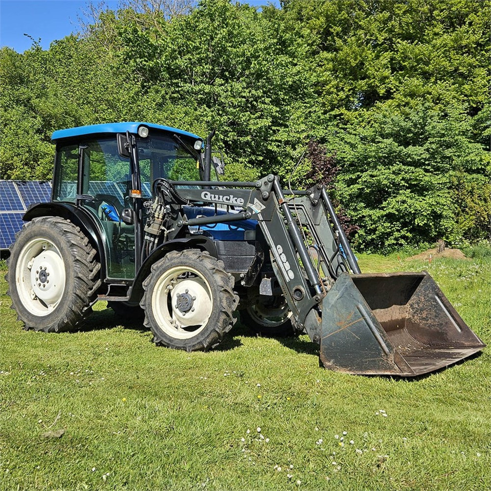 New Holland TN55D - Traktori: kuva New Holland TN55D - Traktori New Holland TN55D - Traktori: kuva New Holland TN55D - Traktori