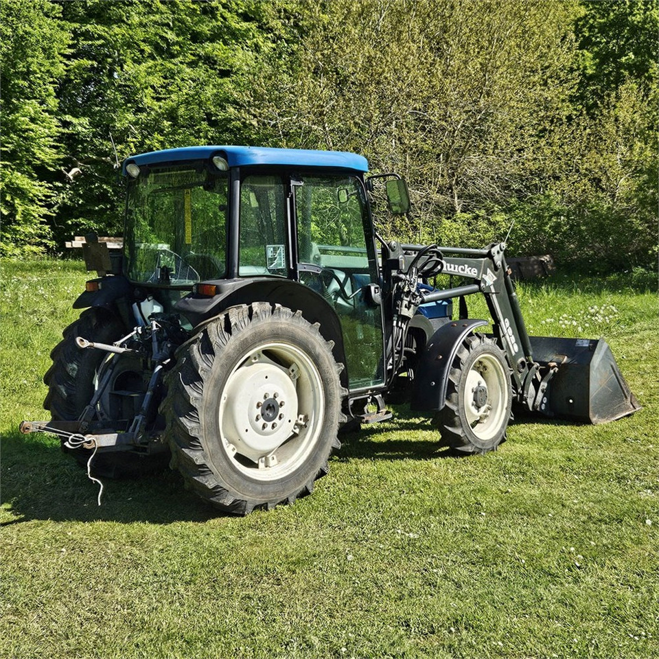 New Holland TN55D - Traktori: kuva New Holland TN55D - Traktori New Holland TN55D - Traktori: kuva New Holland TN55D - Traktori