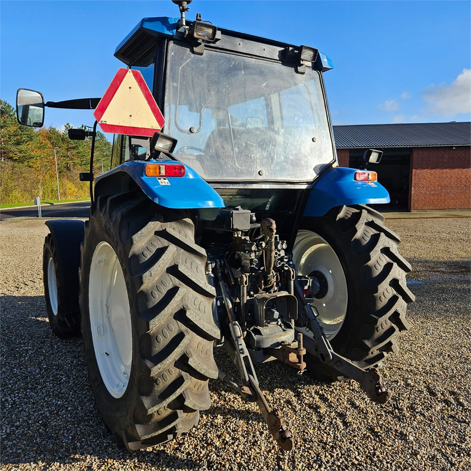 New Holland TS 100 - Traktori: kuva New Holland TS 100 - Traktori New Holland TS 100 - Traktori: kuva New Holland TS 100 - Traktori