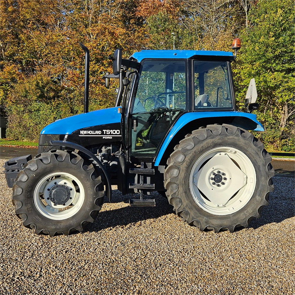 New Holland TS 100 - Traktori: kuva New Holland TS 100 - Traktori New Holland TS 100 - Traktori: kuva New Holland TS 100 - Traktori