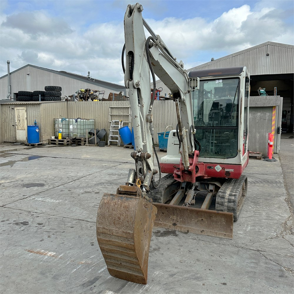 Takeuchi TB125 - Minikuormaaja: kuva Takeuchi TB125 - Minikuormaaja Takeuchi TB125 - Minikuormaaja: kuva Takeuchi TB125 - Minikuormaaja