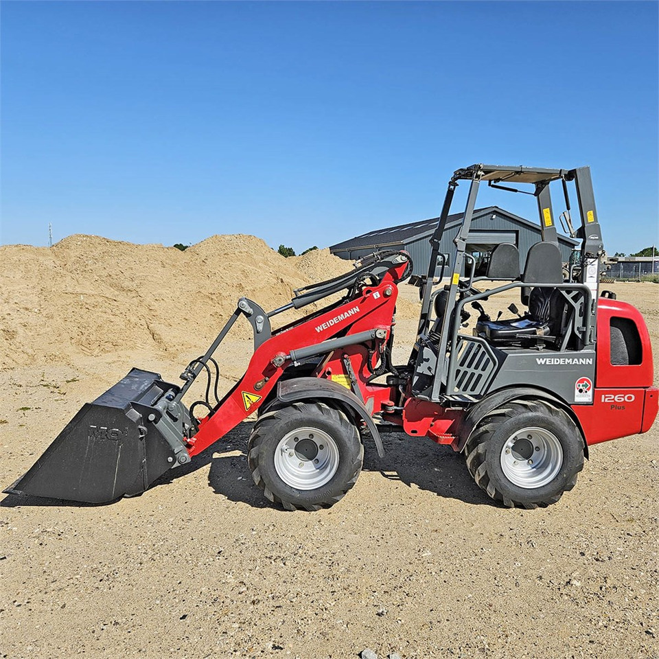 Weidemann 1260 Plus - Pyöräkuormaaja: kuva Weidemann 1260 Plus - Pyöräkuormaaja Weidemann 1260 Plus - Pyöräkuormaaja: kuva Weidemann 1260 Plus - Pyöräkuormaaja