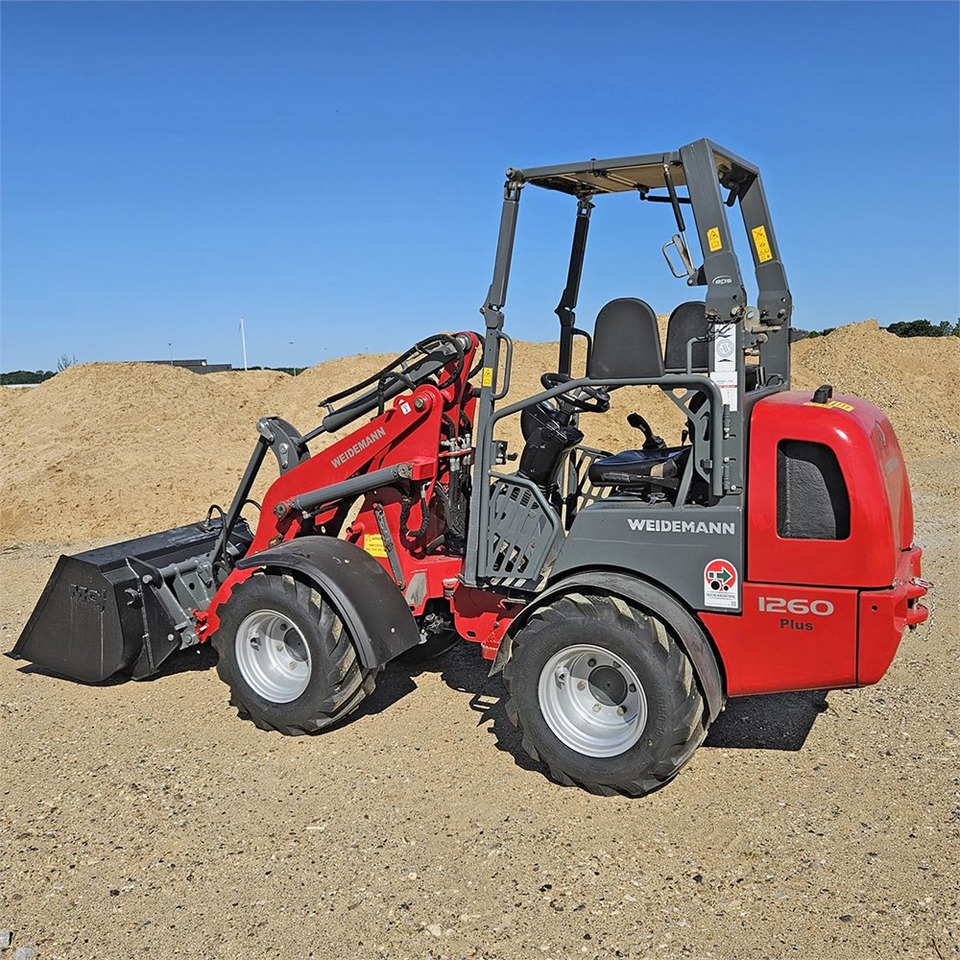 Weidemann 1260 Plus - Pyöräkuormaaja: kuva Weidemann 1260 Plus - Pyöräkuormaaja Weidemann 1260 Plus - Pyöräkuormaaja: kuva Weidemann 1260 Plus - Pyöräkuormaaja