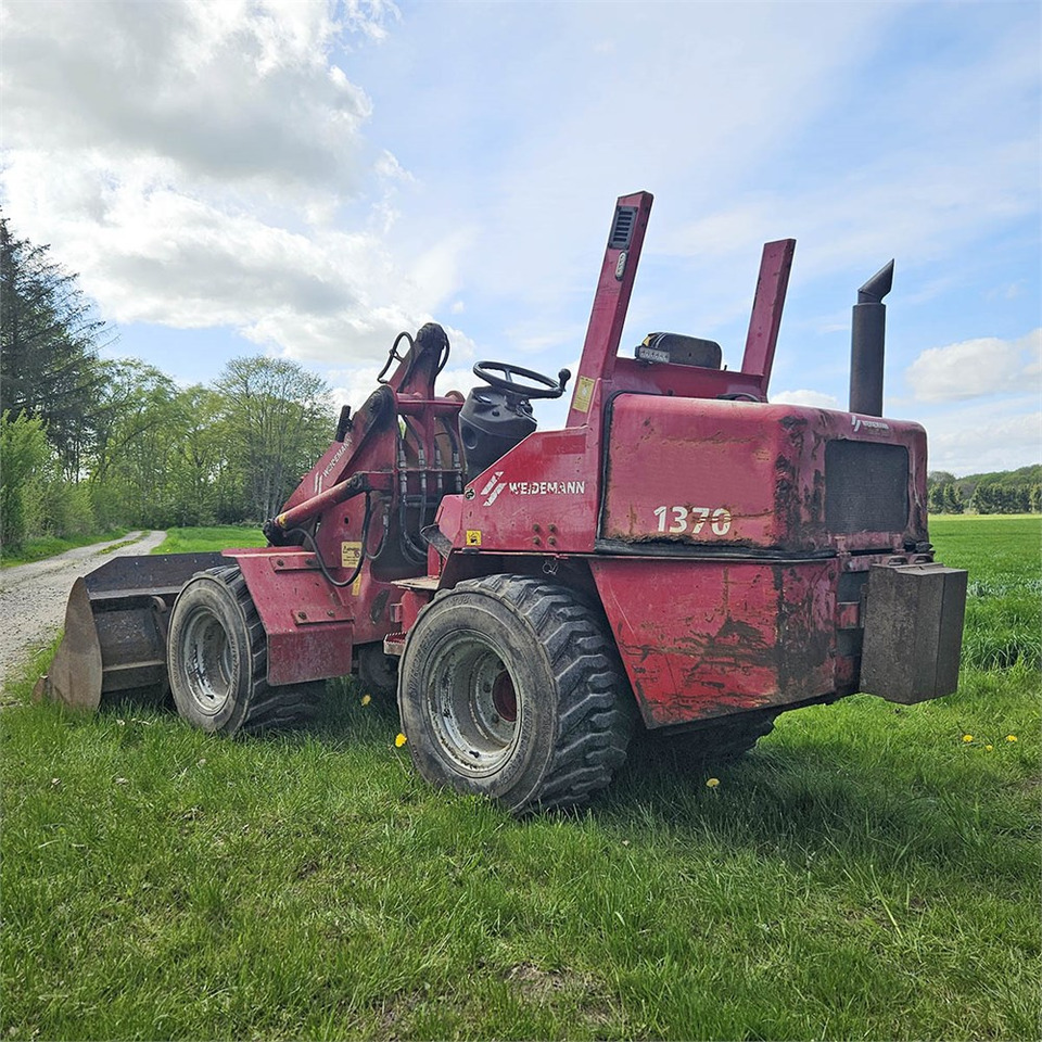 Weidemann 1370 - Pyöräkuormaaja: kuva Weidemann 1370 - Pyöräkuormaaja Weidemann 1370 - Pyöräkuormaaja: kuva Weidemann 1370 - Pyöräkuormaaja