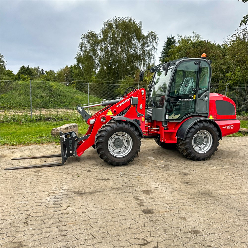 Weidemann 4080 - Pyöräkuormaaja: kuva Weidemann 4080 - Pyöräkuormaaja Weidemann 4080 - Pyöräkuormaaja: kuva Weidemann 4080 - Pyöräkuormaaja