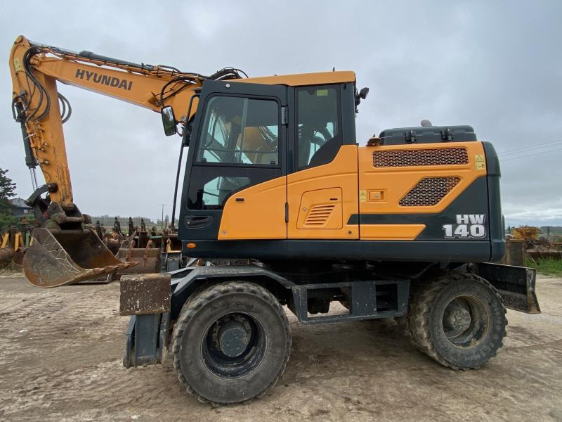 Hyundai HW 140 - Pyöräalustainen kaivinkone: kuva Hyundai HW 140 - Pyöräalustainen kaivinkone Hyundai HW 140 - Pyöräalustainen kaivinkone: kuva Hyundai HW 140 - Pyöräalustainen kaivinkone