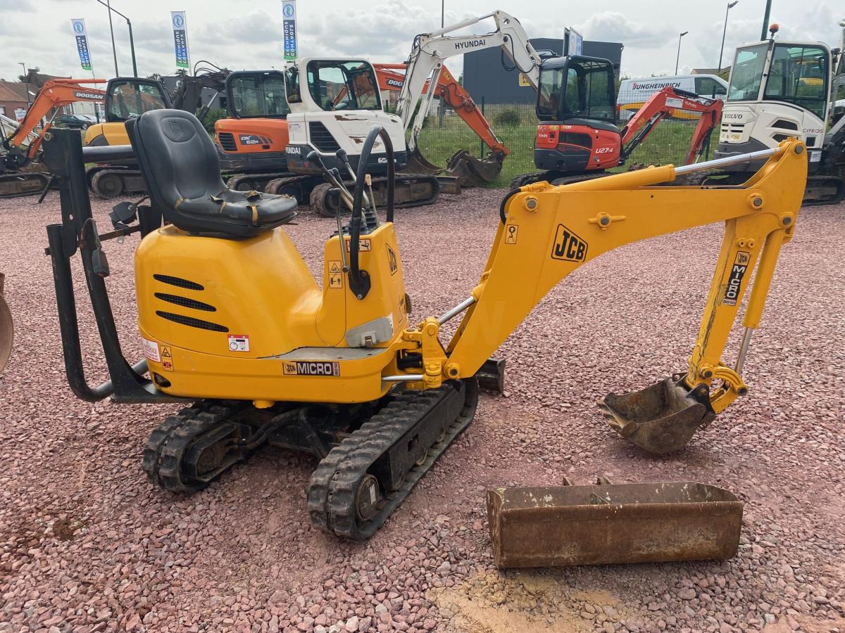 Jcb MICROPELLE 1 TONNE 8010 - Minikuormaaja: kuva Jcb MICROPELLE 1 TONNE 8010 - Minikuormaaja Jcb MICROPELLE 1 TONNE 8010 - Minikuormaaja: kuva Jcb MICROPELLE 1 TONNE 8010 - Minikuormaaja