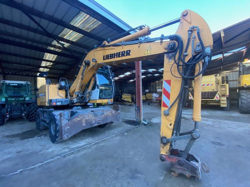 Liebherr A314 Litronic - Pyöräalustainen kaivinkone: kuva Liebherr A314 Litronic - Pyöräalustainen kaivinkone Liebherr A314 Litronic - Pyöräalustainen kaivinkone: kuva Liebherr A314 Litronic - Pyöräalustainen kaivinkone