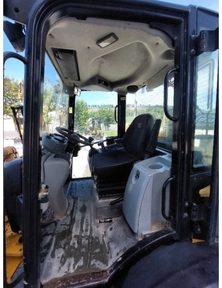 CAT 906H2 - Pyöräkuormaaja: kuva CAT 906H2 - Pyöräkuormaaja CAT 906H2 - Pyöräkuormaaja: kuva CAT 906H2 - Pyöräkuormaaja