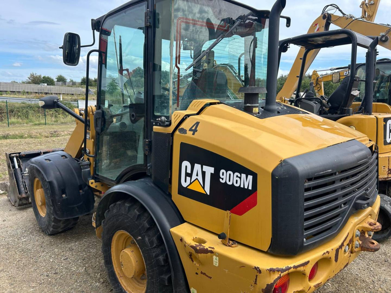 CAT 906M - Pyöräkuormaaja: kuva CAT 906M - Pyöräkuormaaja CAT 906M - Pyöräkuormaaja: kuva CAT 906M - Pyöräkuormaaja