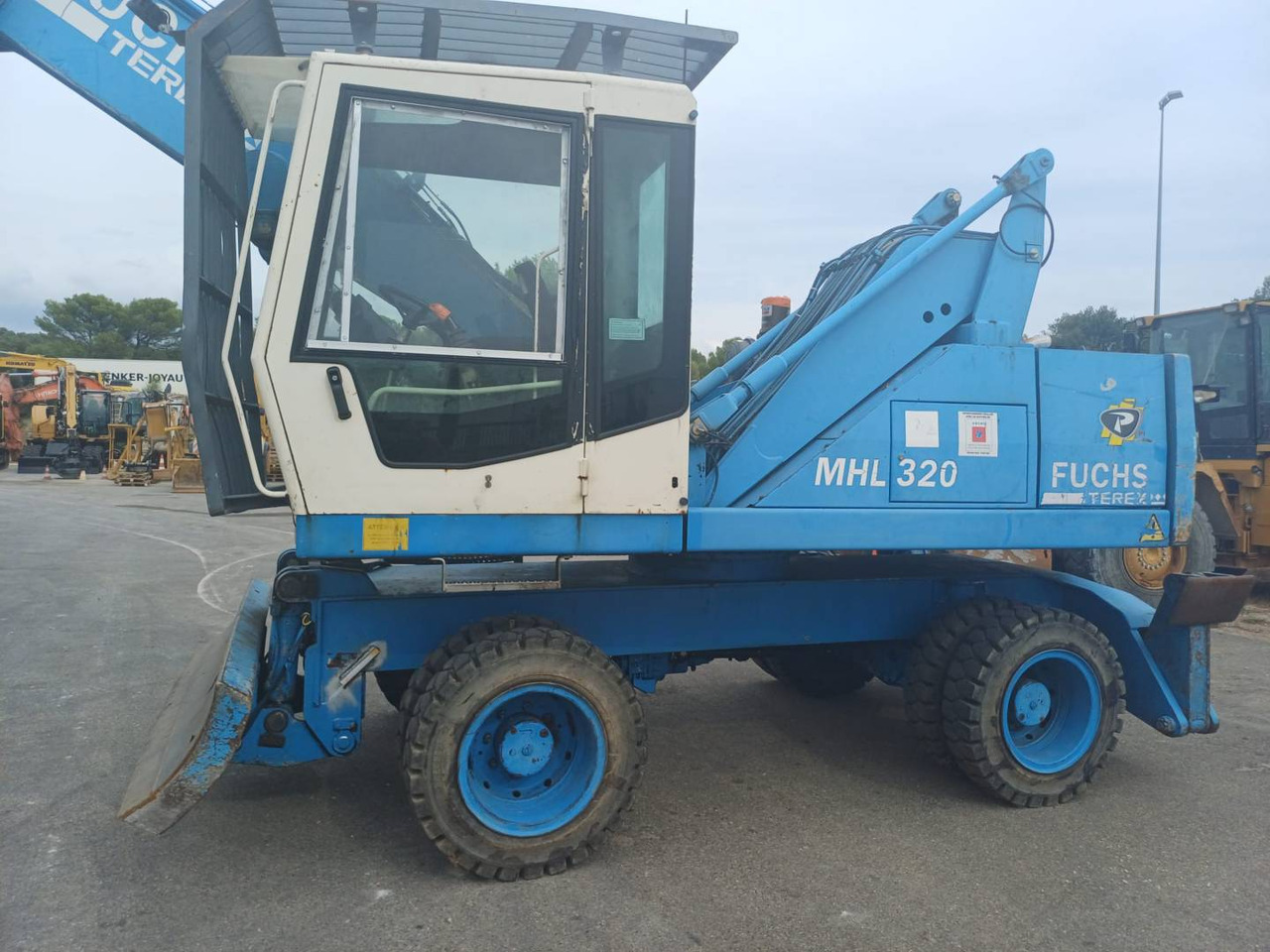 FUCHS MHL320 - Pyöräalustainen kaivinkone: kuva FUCHS MHL320 - Pyöräalustainen kaivinkone FUCHS MHL320 - Pyöräalustainen kaivinkone: kuva FUCHS MHL320 - Pyöräalustainen kaivinkone