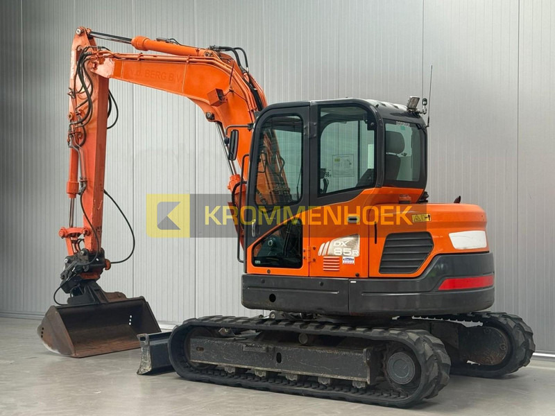 Doosan DX 85R-3 - Minikuormaaja: kuva Doosan DX 85R-3 - Minikuormaaja Doosan DX 85R-3 - Minikuormaaja: kuva Doosan DX 85R-3 - Minikuormaaja