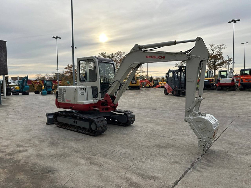Takeuchi TB150C - Telakaivukone: kuva Takeuchi TB150C - Telakaivukone Takeuchi TB150C - Telakaivukone: kuva Takeuchi TB150C - Telakaivukone