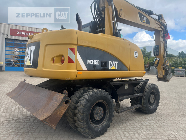 Cat M315D - Pyöräalustainen kaivinkone: kuva Cat M315D - Pyöräalustainen kaivinkone Cat M315D - Pyöräalustainen kaivinkone: kuva Cat M315D - Pyöräalustainen kaivinkone