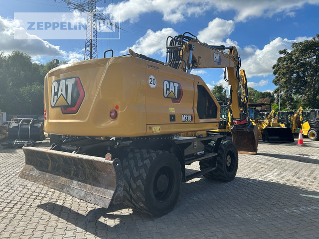 Cat M318-07A - Pyöräalustainen kaivinkone: kuva Cat M318-07A - Pyöräalustainen kaivinkone Cat M318-07A - Pyöräalustainen kaivinkone: kuva Cat M318-07A - Pyöräalustainen kaivinkone