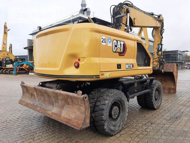 Cat M318-07A - Pyöräalustainen kaivinkone: kuva Cat M318-07A - Pyöräalustainen kaivinkone Cat M318-07A - Pyöräalustainen kaivinkone: kuva Cat M318-07A - Pyöräalustainen kaivinkone