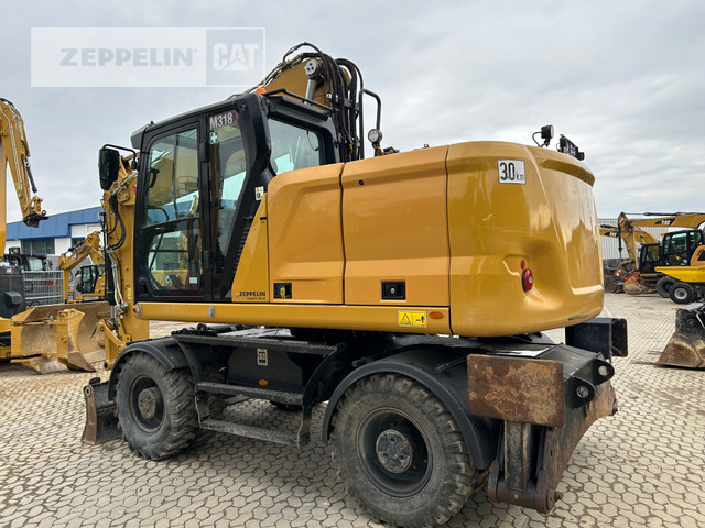 Cat M318-07A - Pyöräalustainen kaivinkone: kuva Cat M318-07A - Pyöräalustainen kaivinkone Cat M318-07A - Pyöräalustainen kaivinkone: kuva Cat M318-07A - Pyöräalustainen kaivinkone