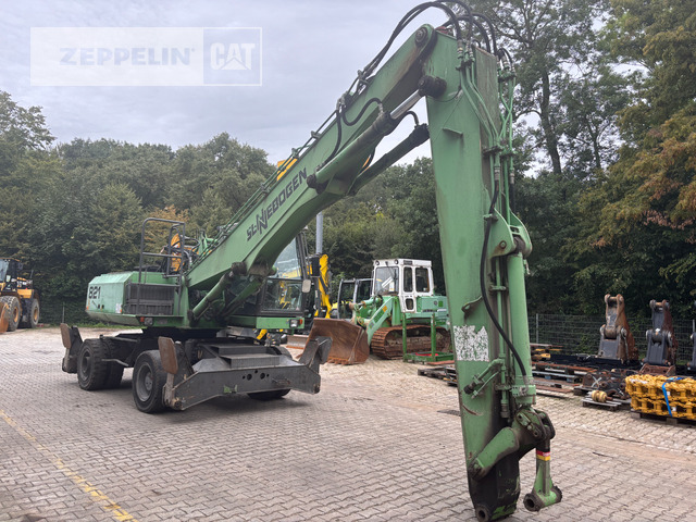 Sennebogen 821 - Materiaalinkäsittelykone: kuva Sennebogen 821 - Materiaalinkäsittelykone Sennebogen 821 - Materiaalinkäsittelykone: kuva Sennebogen 821 - Materiaalinkäsittelykone