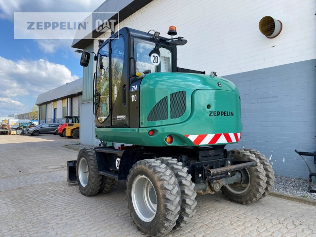Pyöräalustainen kaivinkone Zeppelin ZM110: kuva Pyöräalustainen kaivinkone Zeppelin ZM110 Pyöräalustainen kaivinkone Zeppelin ZM110: kuva Pyöräalustainen kaivinkone Zeppelin ZM110