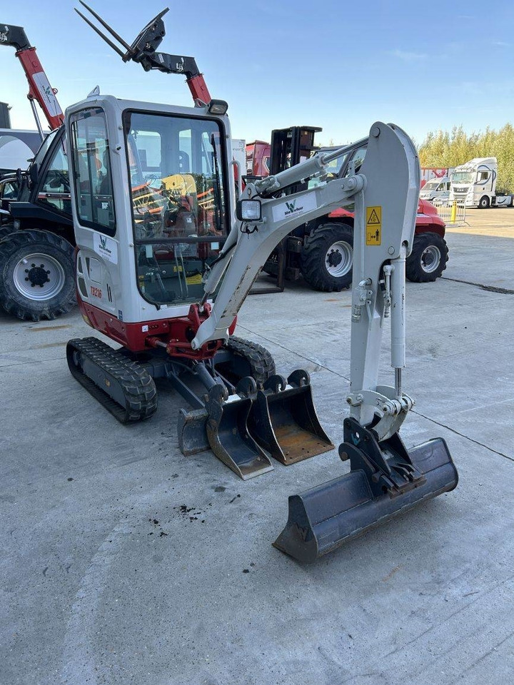 Takeuchi TB216 (11387) - Minikuormaaja: kuva Takeuchi TB216 (11387) - Minikuormaaja Takeuchi TB216 (11387) - Minikuormaaja: kuva Takeuchi TB216 (11387) - Minikuormaaja