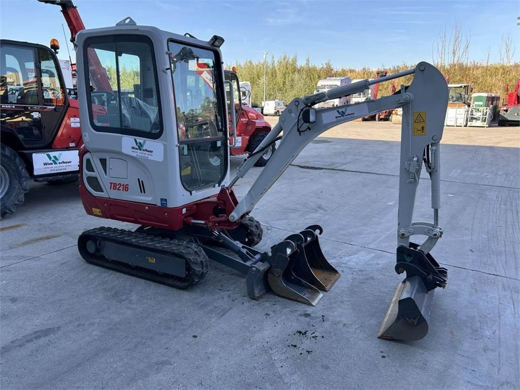 Takeuchi TB216 (11387) - Minikuormaaja: kuva Takeuchi TB216 (11387) - Minikuormaaja Takeuchi TB216 (11387) - Minikuormaaja: kuva Takeuchi TB216 (11387) - Minikuormaaja